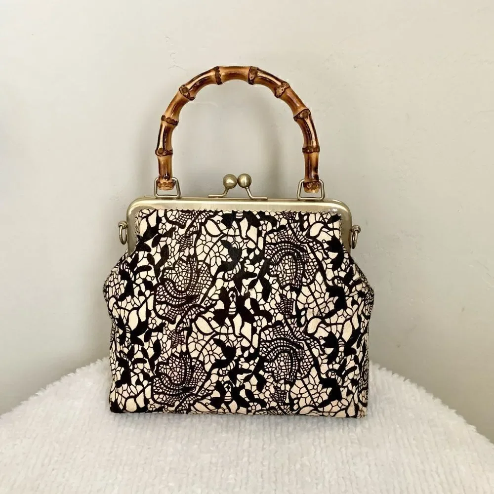 Handmade Real hair-on-horsehide Black Lace Printed Metal Frame Bamboo Handle Bag